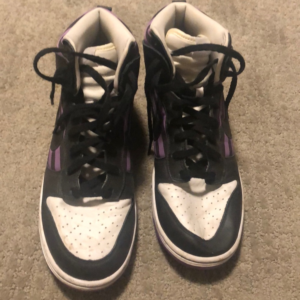 Purple and black Nike sneakers